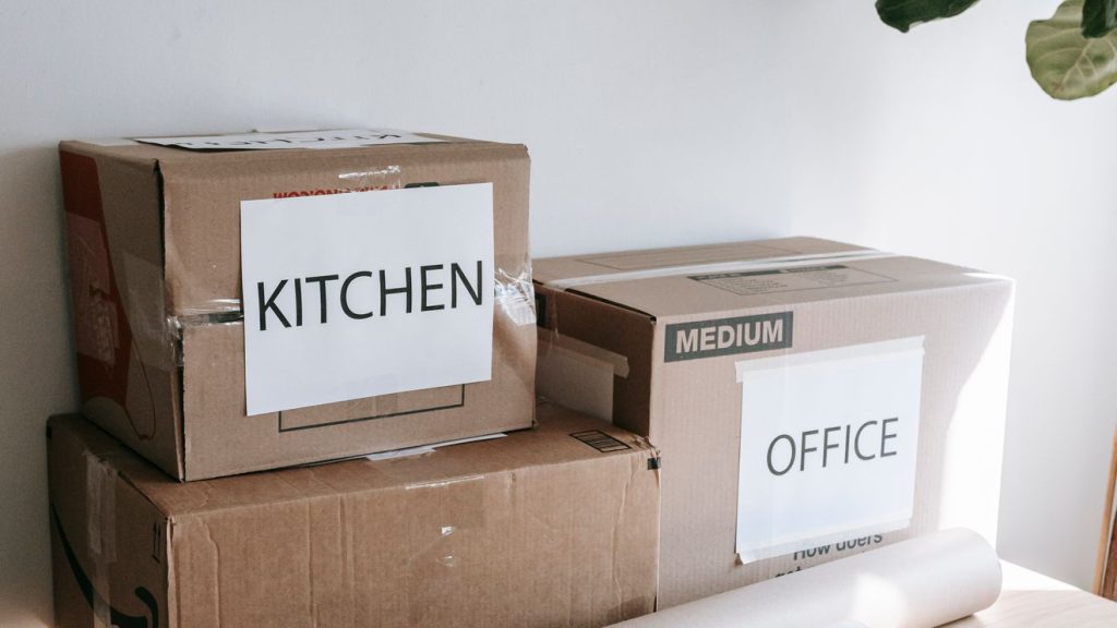 Labeled moving boxes prepared for a residential relocation
